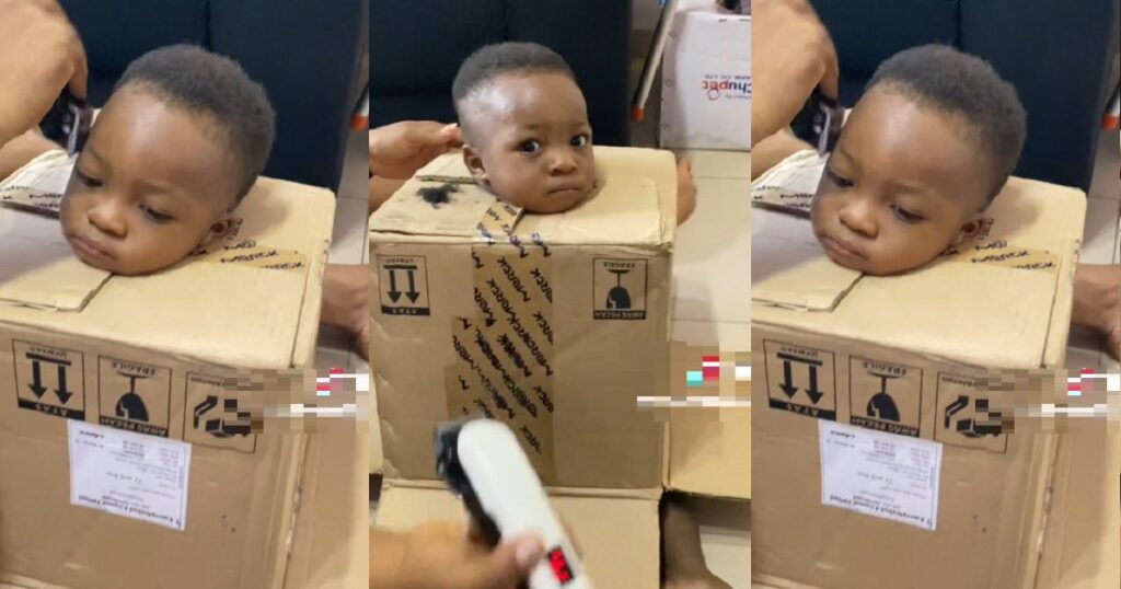 father-puts-troublesome-son-inside-box-to-barb-his-hair