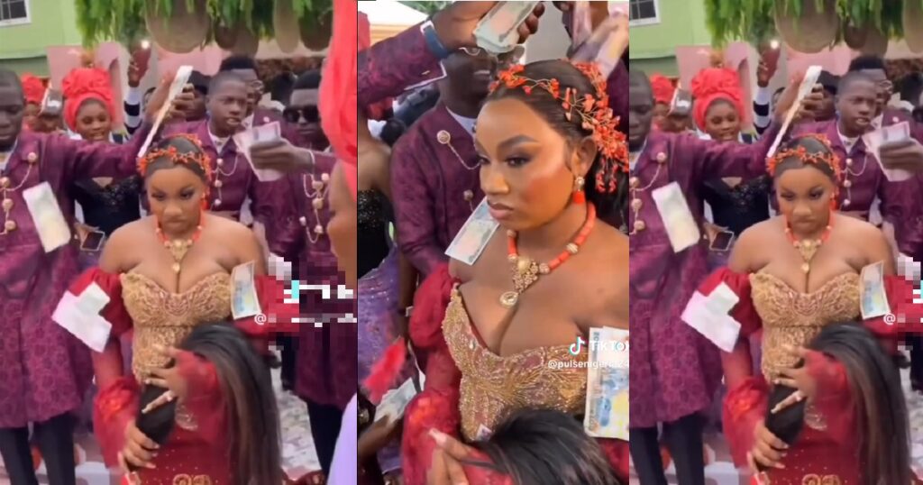“i-would-never-smile-again”-–-reactions-as-beautiful-bride-not-allowed-to-smile-until-groom-sprays-enough-money