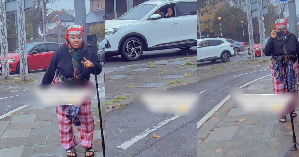 abroad-based-nigerian-lady-causes-traffic-jam-as-a-caucasian-driver-stops-her-car-to-record-her-making-content-(watch)