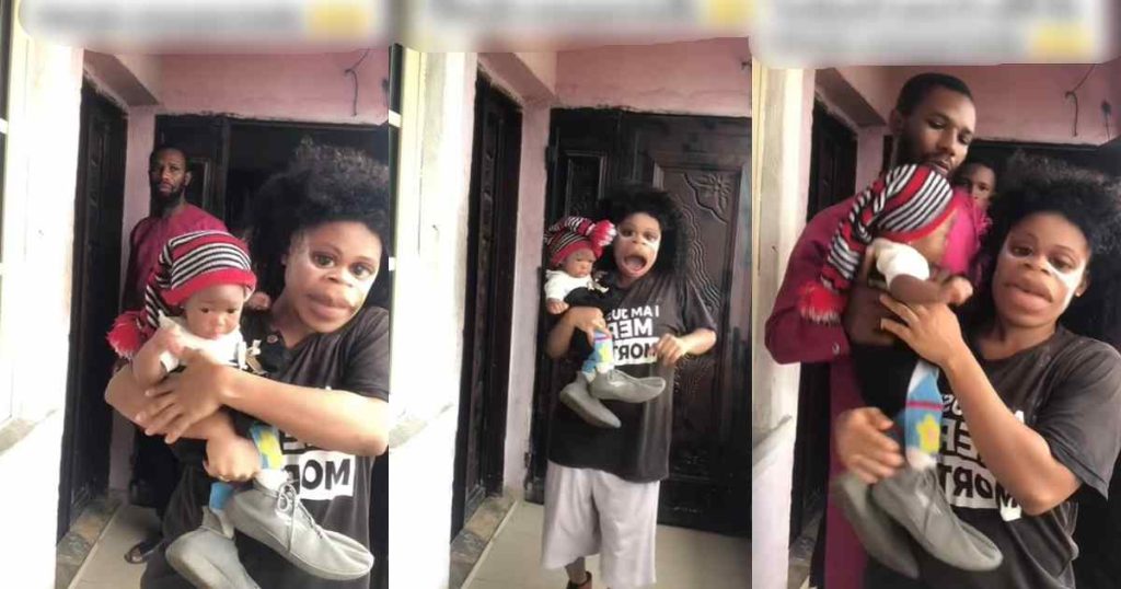 woman-caught-off-guard-by-her-husband-and-his-friend-while-dancing-with-their-baby-on-camera(watch)