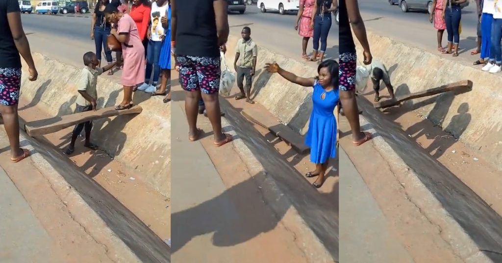 man-manually-operates-a-makeshift-bridge-in-town-to-make-ends-meet-(watch)