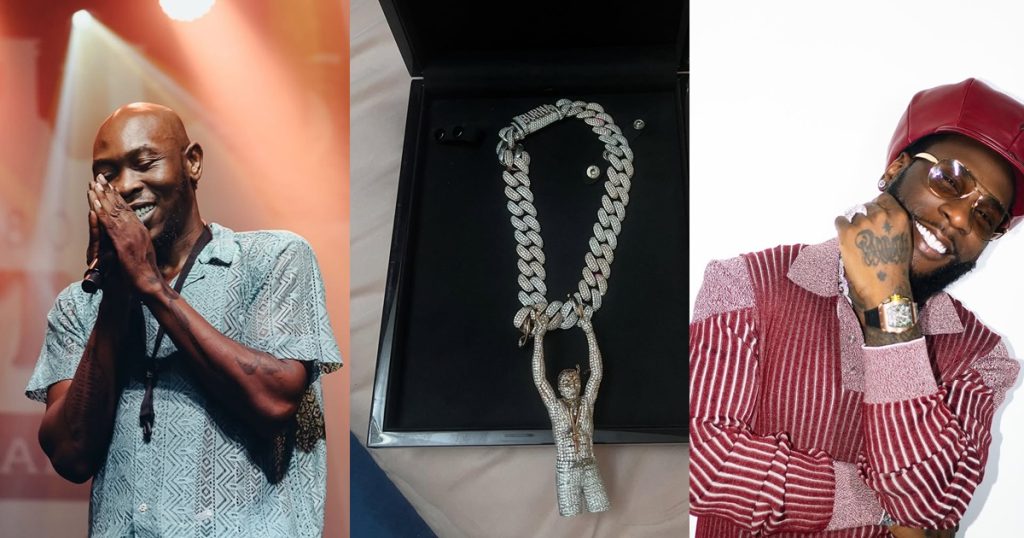 burna-boy-gifts-seun-kuti-a-custom-necklace-of-his-father,-fela-kuti,-after-their-first-official-meeting-(images)