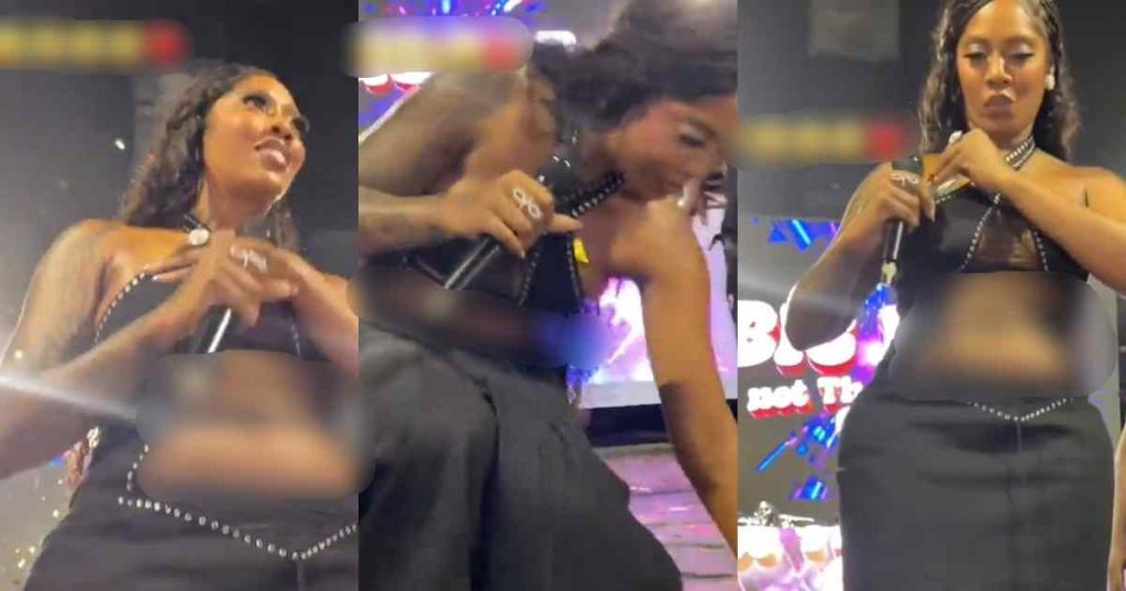 hilarious-moment-singer-tiwa-savage-stores-the-dollar-bill-from-a-fan-in-her-‘natural-safe’-(watch)