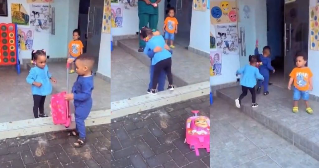“this-boy-is-more-loving-and-caring-than-some-matured-men”-–-little-boy-warms-hearts-as-he-embraces-and-assists-his-classmate-with-her-bag-on-their-first-day-of-school (watch)
