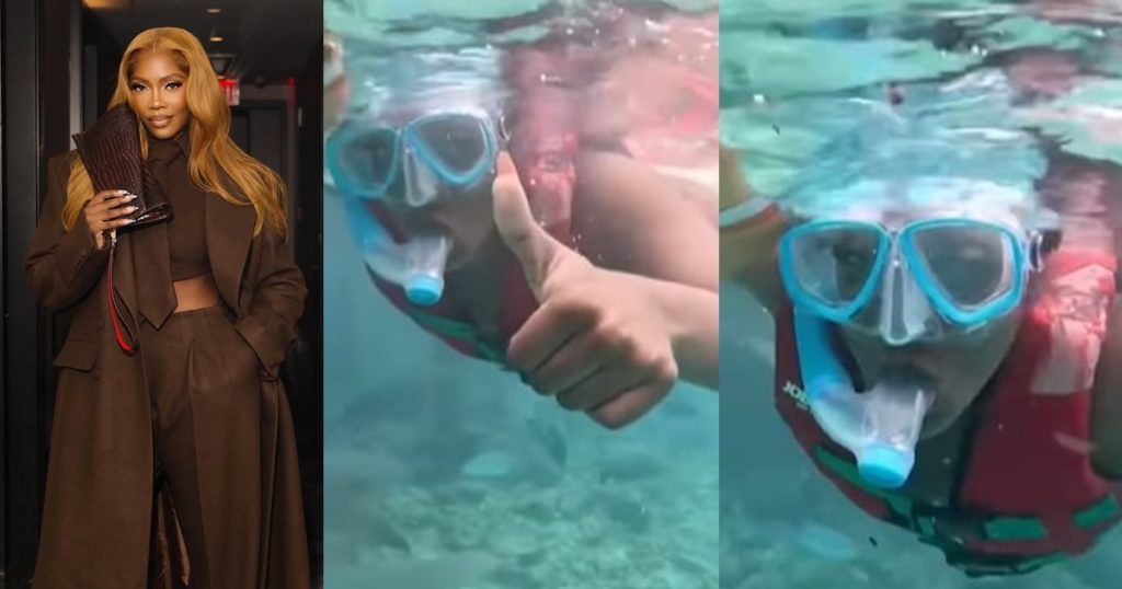 singer-tiwa-savage-shares-a-video-of-herself-swimming-with-sh@rks-(watch)