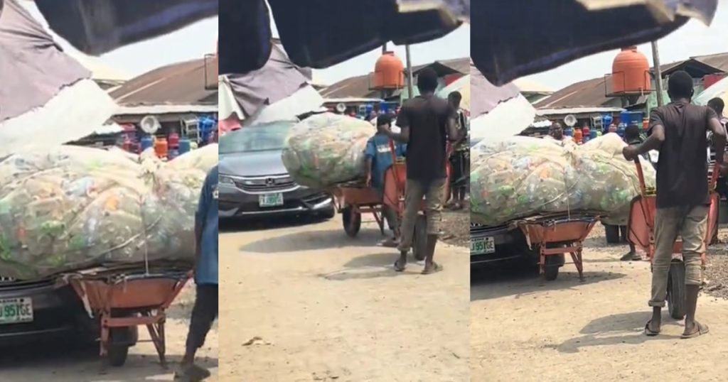 drama-ensues-as-a-wheelbarrow-pusher-bl0cks-a-car-on-a-roadway-at-a-local-market-(video)