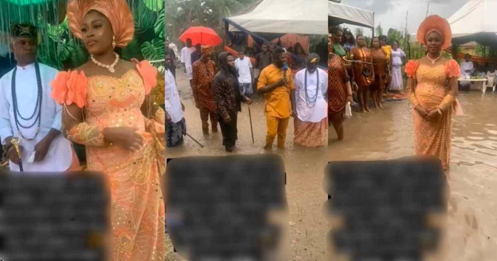 “not-even-the-rain-can-stop-the-bride-on-her-traditional-day”-–-nigerian-couple-boldly-went-ahead-with-their-traditional-wedding-ceremony-despite-a-heavy-downpour-that-left-the-venue-fl00ded-(watch)