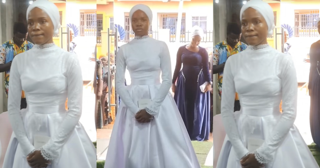 bride-chooses-to-hold-a-bible-instead-of-a-bouquet-as-she-walks-down-the-aisle-(video)